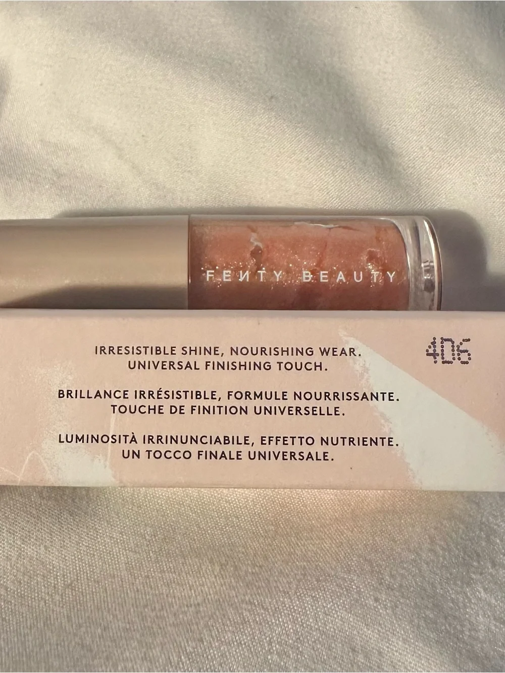 Fenty Beauty Gloss Bomb Lip Luminizer — Shimmery Peachy Gold